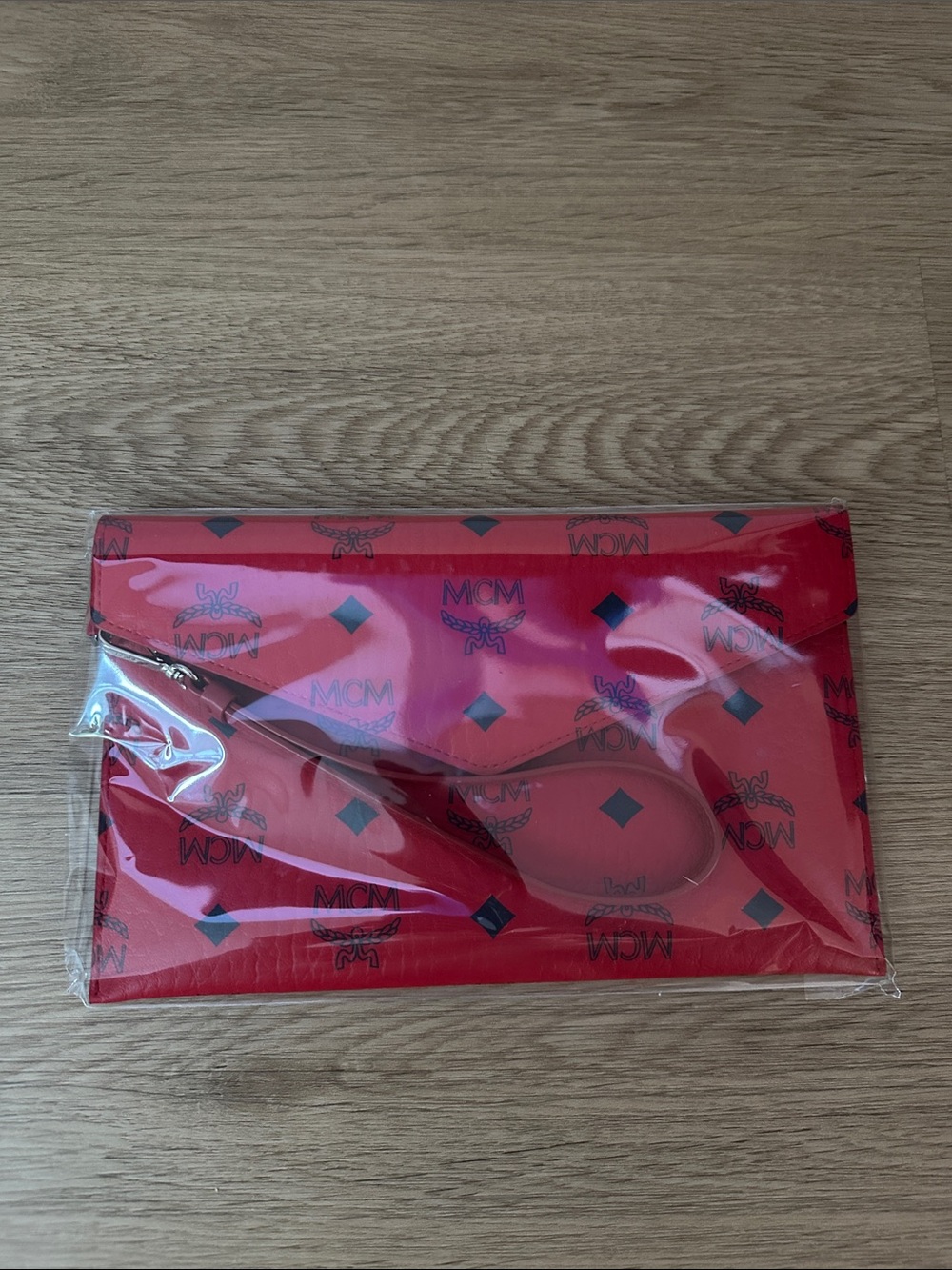 Authentic MCM Red Visetos Monogram Robot Rabbit Wristlet